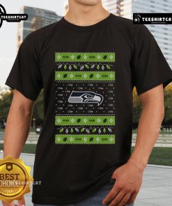 Seattle Seahawks Holiday Christmas T-Shirt featuring festive design and team colors, perfect for game day celebrations.
