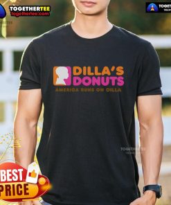 Alt Text: Top Dilla's Donuts America Runs On Dilla T-Shirt featuring a colorful donut graphic and bold text design.