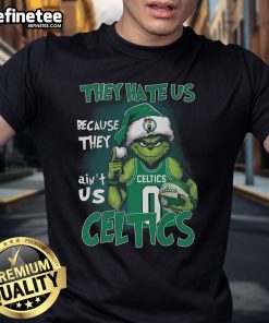 Top Grinch They Hate Us Because They Ain'T Us Boston Celtics T-Shirt featuring Grinch graphic and team colors.