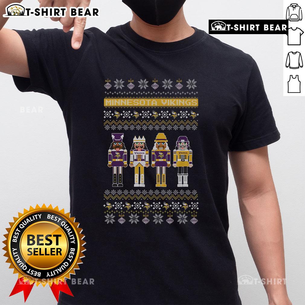 Top Minnesota Vikings Holiday Nutcracker T Shirt Top Minnesota Vikings Holiday Nutcracker T-Shirt featuring festive design, perfect for fans celebrating the season.