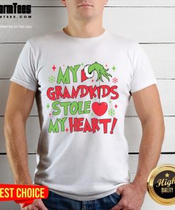 Vintage Grandma Christmas T-Shirt featuring 'My Grandkids Stole My Heart' design, perfect for festive family gatherings.