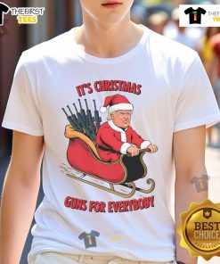 Top Second Amendment Trump as Santa Christmas T-Shirt featuring festive design and patriotic themes for holiday wear.