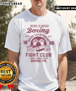 Top Vintage Style Boxing Gloves T-Shirt featuring retro design and classic boxing imagery for boxing enthusiasts.