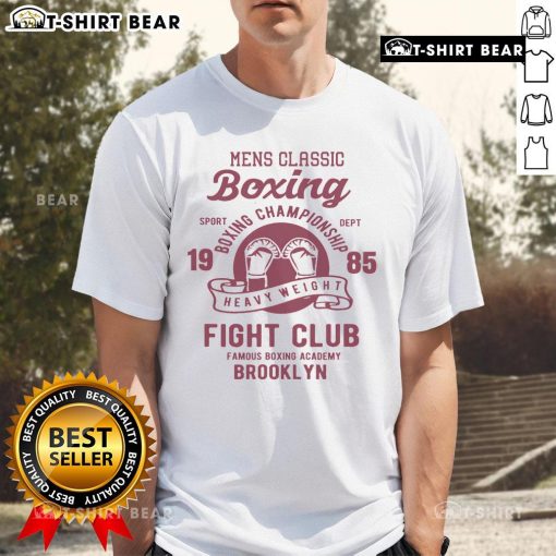 Top Vintage Style Boxing Gloves T-Shirt featuring retro design and classic boxing imagery for boxing enthusiasts.