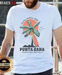 Family in matching Dominican Republic T-shirts enjoying their Awesome Punta Cana vacation 2025 on the beach.