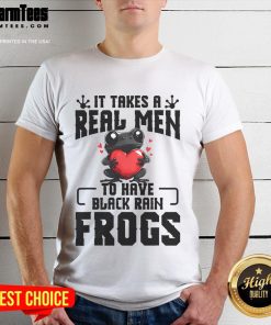 Adorable black rain frog in a terrarium, featured on a 'Dad Rain Frog' T-shirt for frog lovers and enthusiasts.