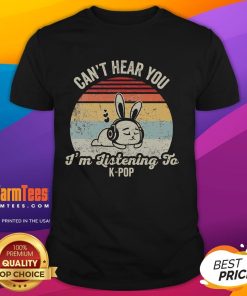 Alt Text: Cute bunny wearing a vintage sunset t-shirt that says Can't hear you, I'm listening to Kpop. Perfect for fans!