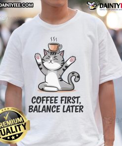 Cute Cat Yoga Coffee First Balance Later T-Shirt featuring a playful cat in a yoga pose with coffee graphics.