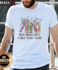 Alt Text: Cute floral design on a 'Never Underestimate A Public School Teacher' t-shirt, perfect for educators and supporters.