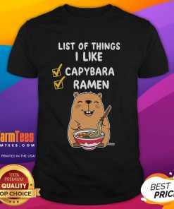 Alt Text: Cute kawaii capybara graphic on a ramen T-shirt, showcasing a list of things I like in a playful design.
