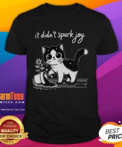 Alt Text: Cute tuxedo cat funny meme on a T-shirt with a quote about sparking joy, perfect for cat lovers.