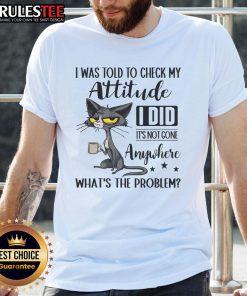 Funny cat graphic on a coffee-themed t-shirt with sarcasm text about checking attitude, perfect for cat lovers.