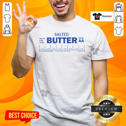 Funny Foodie Baker wearing a quirky T-shirt while baking with salted butter, showcasing a playful passion for cooking.