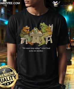 Funny frog graphic on a t-shirt with the phrase 'We Must Stop Eating Toad' highlighting humor in animal conservation.
