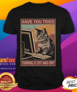 Funny cat t-shirt featuring tech support humor: 'Have You Tried Turning It Off And On?' perfect for tech lovers.