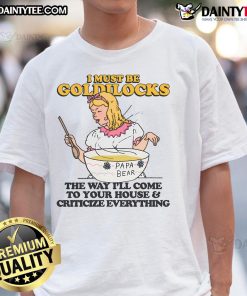 Alt Text: Funny Goldilocks t-shirt design featuring humorous quote about critiquing homes, perfect for casual wear.