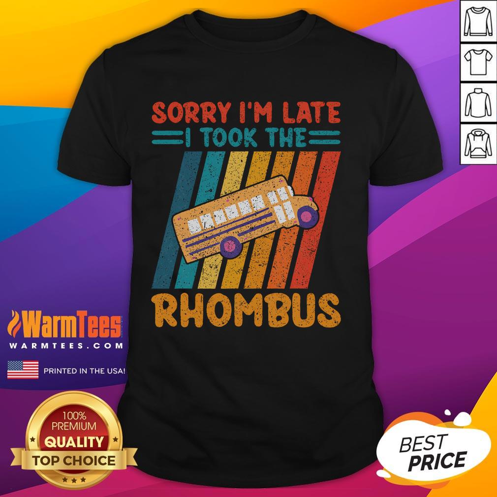Funny Math Teacher Sorry I'M Late I Took The Rhombus Vintage T Shirt Funny math teacher wearing a vintage Sorry I'm Late I Took The Rhombus T-shirt in a classroom setting.