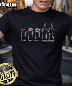 Alt Text: Cute kitten in a funny 'Razor-Tipped Murder-Mittens' T-shirt playing rock paper scissors with paws.