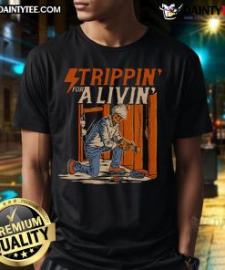 Funny Trippin For A Livin Skeleton Electrician T-Shirt featuring a humorous skeleton design with electrical tools.