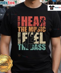 Alt Text: Vintage T-shirt featuring the phrase You Can Hear The Music But You Feel The Bass in a funky design.