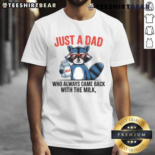 Funny raccoon t-shirt featuring 'Good Just Dad Who Always Came Back With The Milk' slogan for dads and animal lovers.