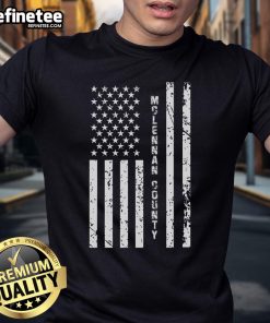 Distressed US flag design on a Hot McLennan County T-shirt, perfect for showcasing pride in the United States.