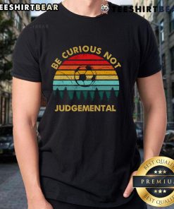 Vintage sunset t-shirt featuring 'Be Curious Not Judgemental' slogan, perfect for football fans seeking inspiration.