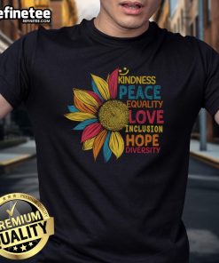 Vibrant sunflower design on a T-shirt promoting peace, love, inclusion, equality, and diversity.