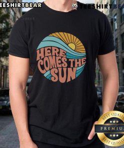 Alt Text: Nice Here Comes The Sun T-Shirt featuring a vibrant sun graphic, perfect for summer fashion and casual wear.