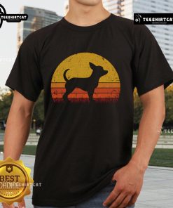 Nice retro Chihuahua dog silhouette against a sunset on a stylish t-shirt, perfect for dog lovers and vintage fashion fans.