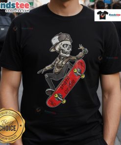Cool skeleton skateboarder in 'Skate Or Die' T-shirt performing tricks on a skateboard for a stylish urban vibe.