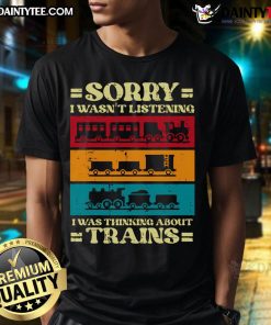 Vintage T-shirt with 'Sorry I Wasnt Listening, I Was Thinking About Trains' graphic design for train enthusiasts.