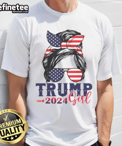 Girl wearing a messy bun and a Trump 2024 election T-shirt with an American flag design, promoting Nice Trump Girl style.