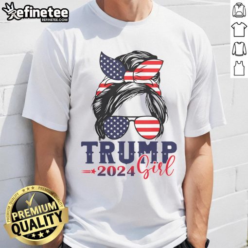 Girl wearing a messy bun and a Trump 2024 election T-shirt with an American flag design, promoting Nice Trump Girl style.