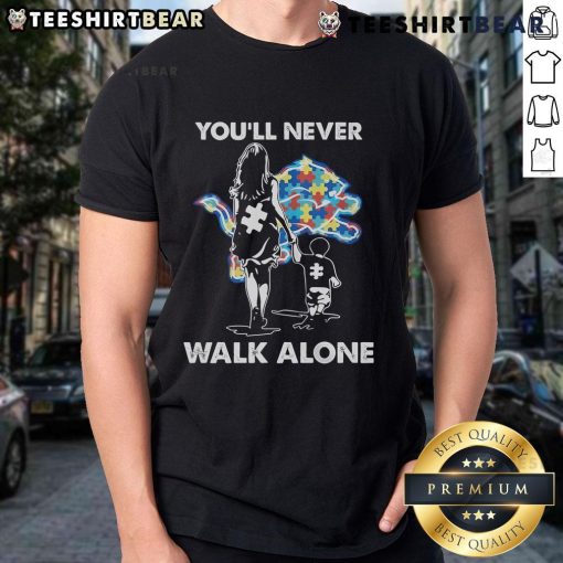 Blue Detroit Lions T-shirt with 'You'll Never Walk Alone' graphic, perfect for fans and sports enthusiasts.