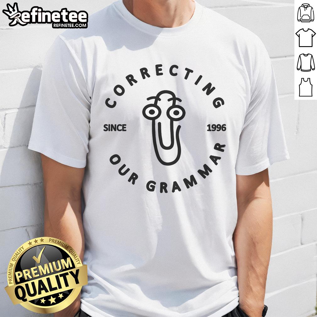 Official Correcting Your Grammar Since 1996 Microsoft Clippy T Shirt Official Microsoft Clippy T-Shirt for grammar lovers, featuring 'Correcting Your Grammar Since 1996' design.