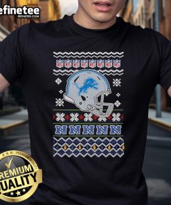 Official Detroit Lions NFL football Christmas helmet T-shirt featuring festive design for fans celebrating the holiday season.