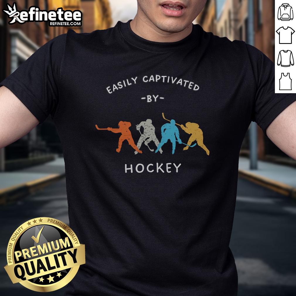 Official Easily Captivated By Hockey T Shirt Official Easily Captivated By Hockey T-Shirt featuring a bold design for hockey enthusiasts and fans.