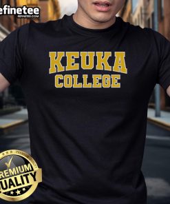 Official Keuka College Apparel Sports Fan T-Shirt featuring the college logo in vibrant green and gold colors.