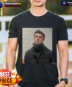 Official Luigi Mangione's mugshot t-shirt featuring a bold graphic design and eye-catching text for fans and collectors.