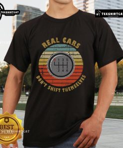 Official Real Cars Don't Shift Themselves Manual Transmission Vintage T-Shirt design featuring a retro car graphic.