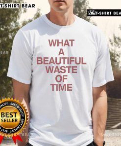 Official Selfish Sons What A Beautiful Waste Of Time T-Shirt featuring bold graphic design on a black background.