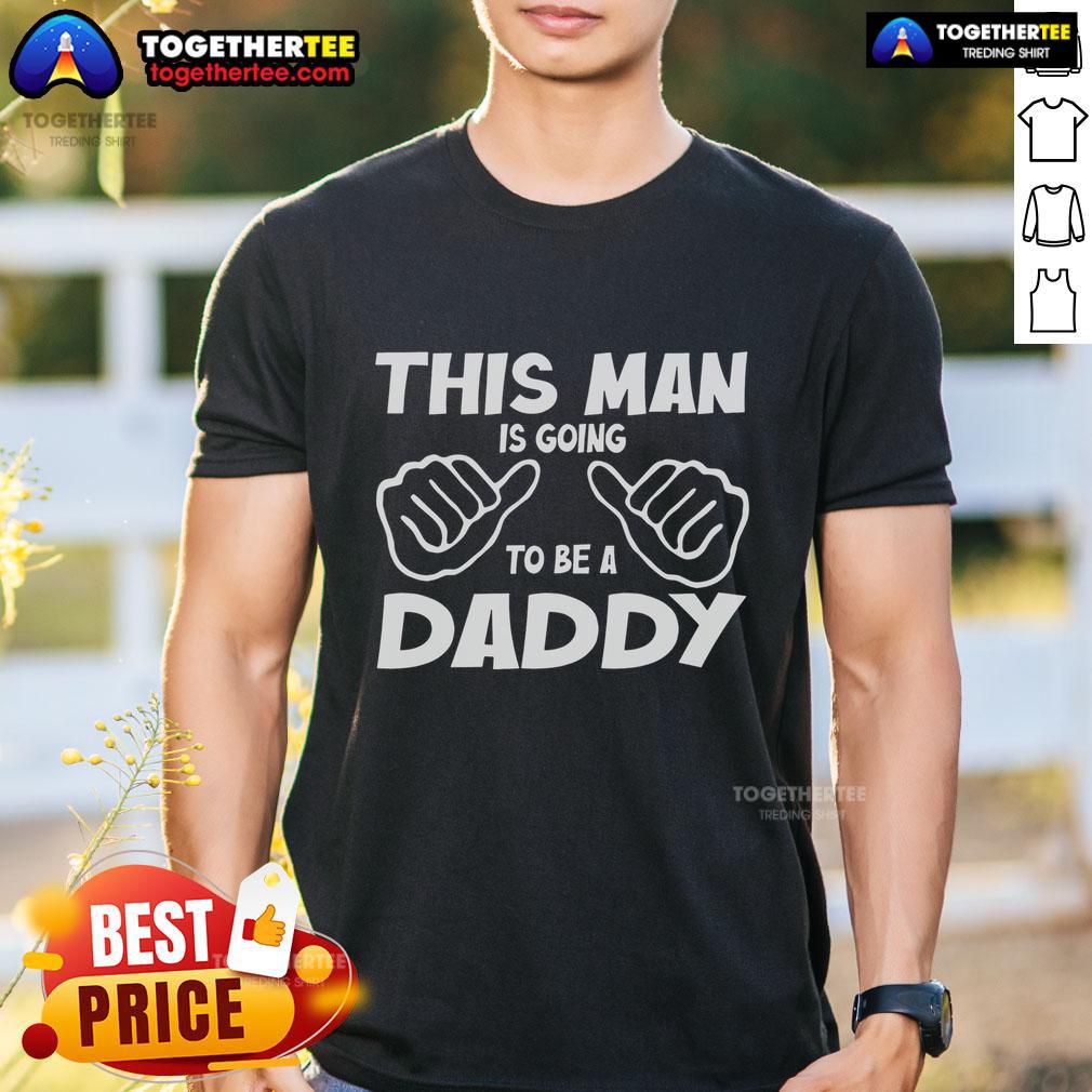 Official This Man Is Going To Be A Daddy T Shirt Official 'This Man Is Going To Be A Daddy' T-Shirt featuring playful design for expectant fathers.