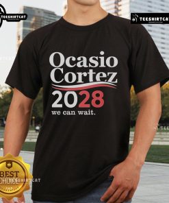 Alt Text: Official We Can Wait Ocasio-Cortez 2028 T-Shirt featuring bold graphic design and campaign slogan.