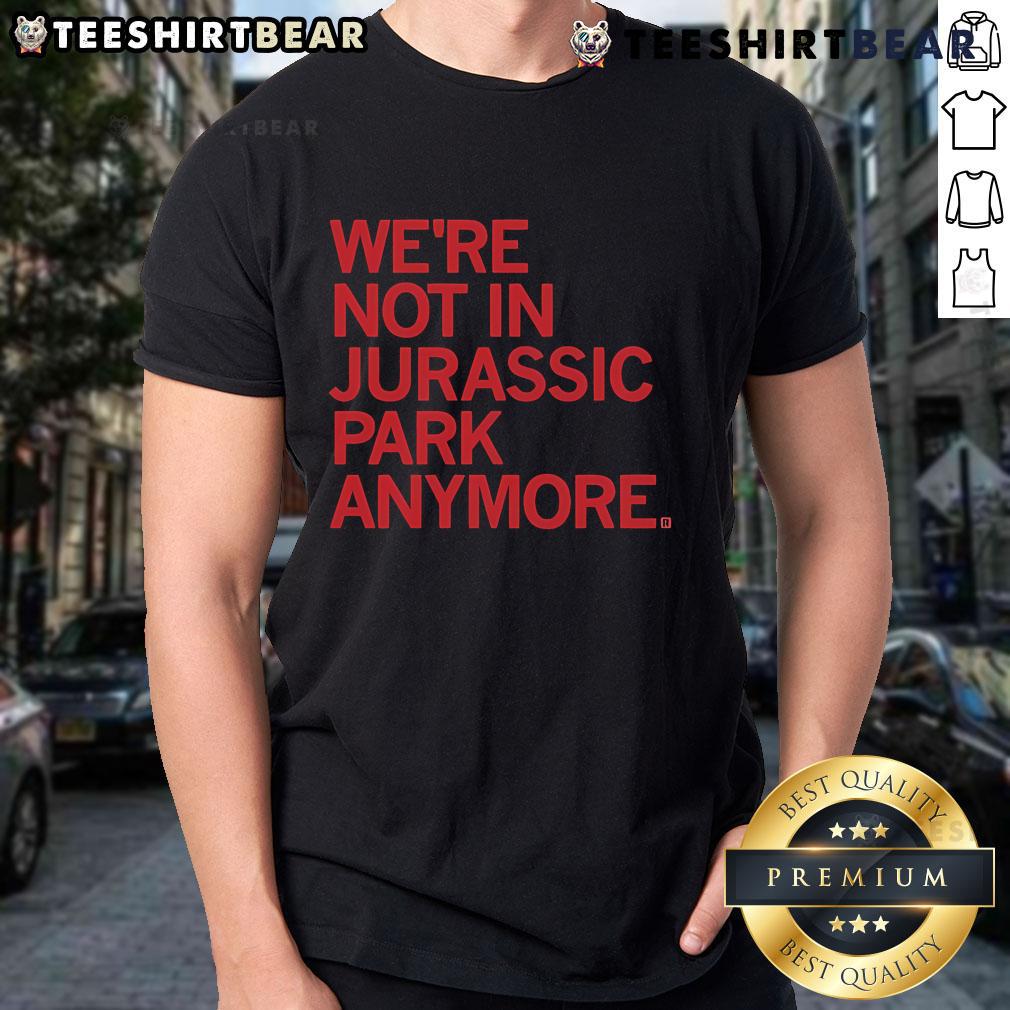 Official We'Re Not In Jurassic Park Anymore T Shirt Alt Text: Official We'Re Not In Jurassic Park Anymore T-Shirt featuring a fun dinosaur graphic and vibrant colors for fans.