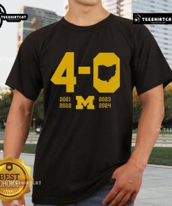 Premium 4.0 In The Game Michigan Football T-Shirt featuring vibrant colors and team logo, perfect for fans.