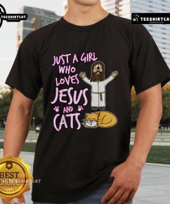 Alt Text: Premium Just A Girl Who Loves Jesus And Cats T-Shirt featuring a cute graphic design of a girl, cross, and cat.