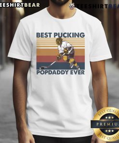 Alt Text: Funny hockey grandpa saying t-shirt featuring 'Pretty Best Pucking Popdaddy Ever' design for hockey fans.