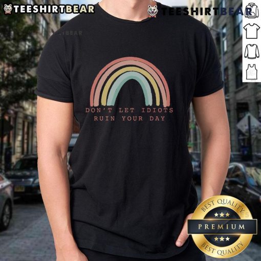 Colorful 'Don't Let Idiots Ruin Your Day' rainbow inspirational T-shirt design promoting positivity and happiness.