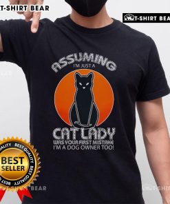 Funny T-shirt design: 'Assuming I'm Just A Cat Lady Was Your First Mistake, I'm A Dog Owner Too' for pet lovers.